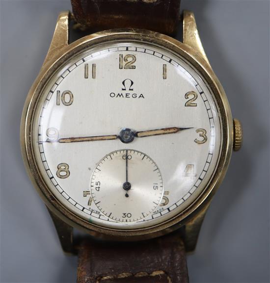 A gentlemans 1950s? 9ct. gold Omega manual wind wrist watch, with Arabic dial and subsidiary seconds,